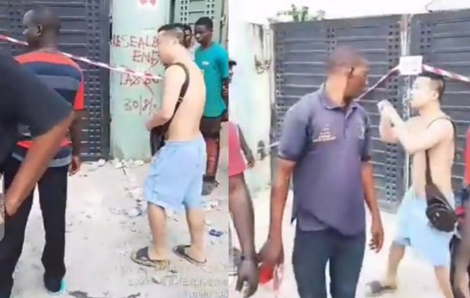 VIDEO: Chinese Man Caught On Camera Tearing Naira Notes