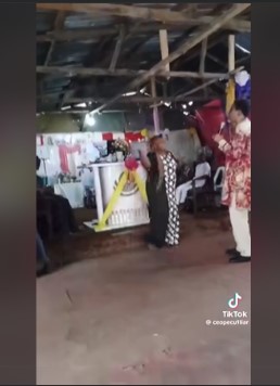 WATCH: Pastor Assaults Female Church Member, Flogs Her Because Her Child “Disturbed Service”